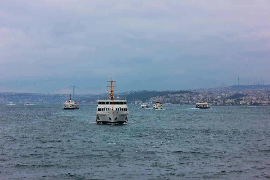 Several ferries navigate the Bosphorus in Istanbul, showcasing maritime transportation.