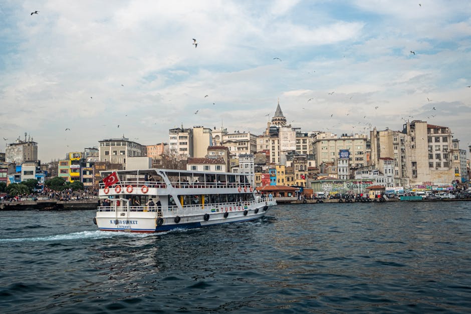 Ferry on the Bosphorus with Istanbul's skyline in the background.